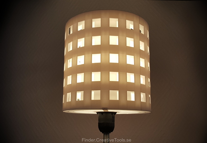 3d-printable_lampshade_for_standard_light_fixture_concentric_perforated_shading_walls.jpg